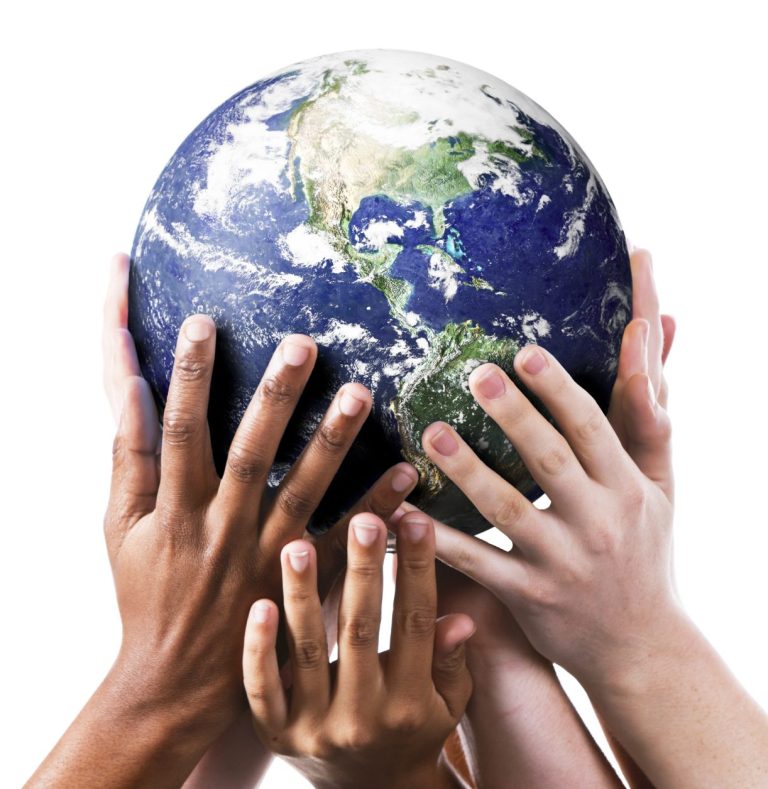 Diverse hands holding a globe, symbolising unity and global cooperation.